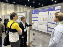 Alexander Siegman presenting his research on the chemotherapy erlotinib in colorectal cancer.